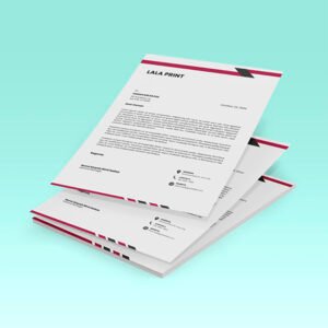 a stack of company letterhead with text on them.